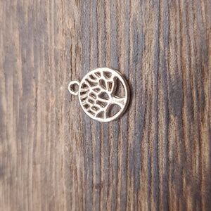P133 tree of life charm
